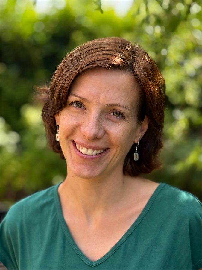 Caro von Köpfchenwerk lächelt in die Kamera